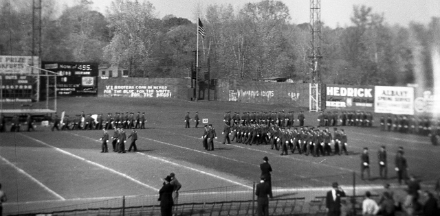 CBA marches at the VI game.  The night before somebody painted the phrase V.I. ROOTERS COME IN HERDS, FOR THE BLUE, FOR THE WHITE, FOR THE BIRDS and something about .....IDIOTS on the outfield fence.  I wonder who?